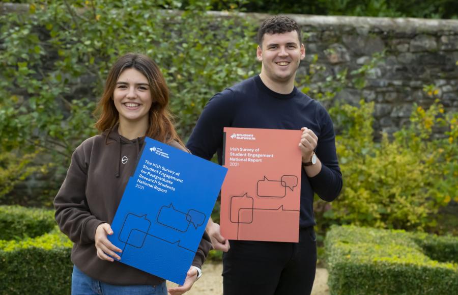 Students holding 2021 reports